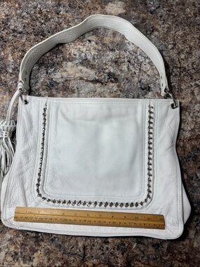 White Pebbled Leather Shoulder Bag with Stud Trim and Tassel